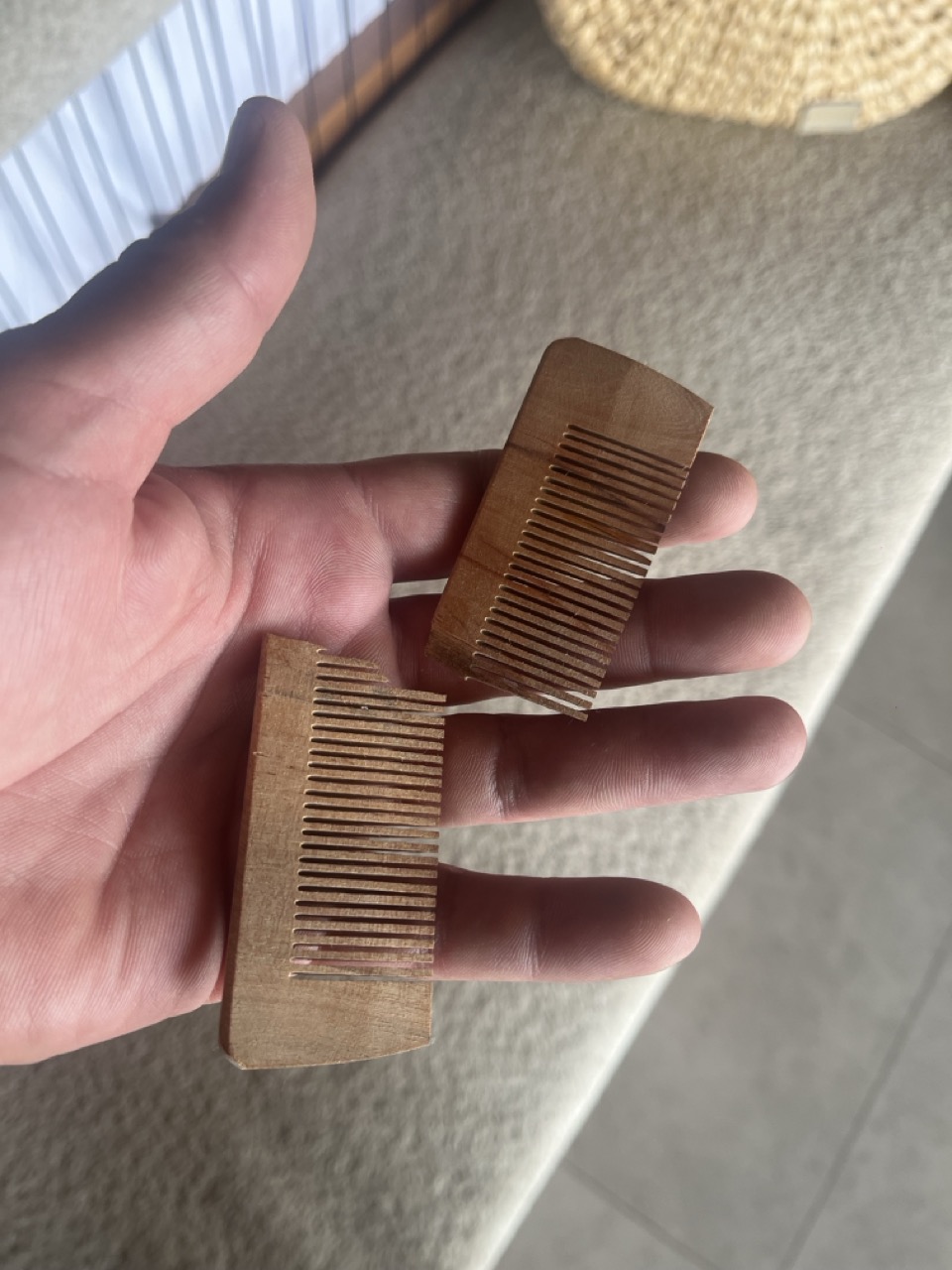Wooden comb broken in half